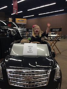 girl enjoying the car rid